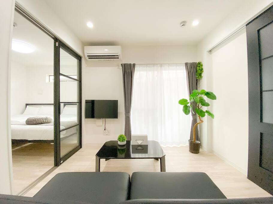 Residential Hotel Glitter Usjまで1駅5分 Osaka Room photo