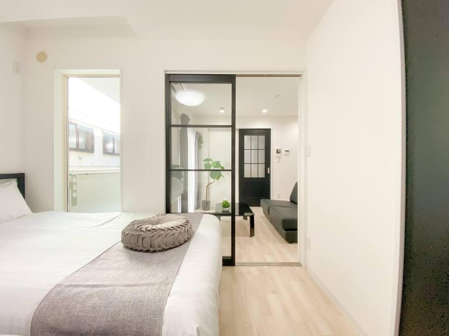 Residential Hotel Glitter Usjまで1駅5分 Osaka Room photo