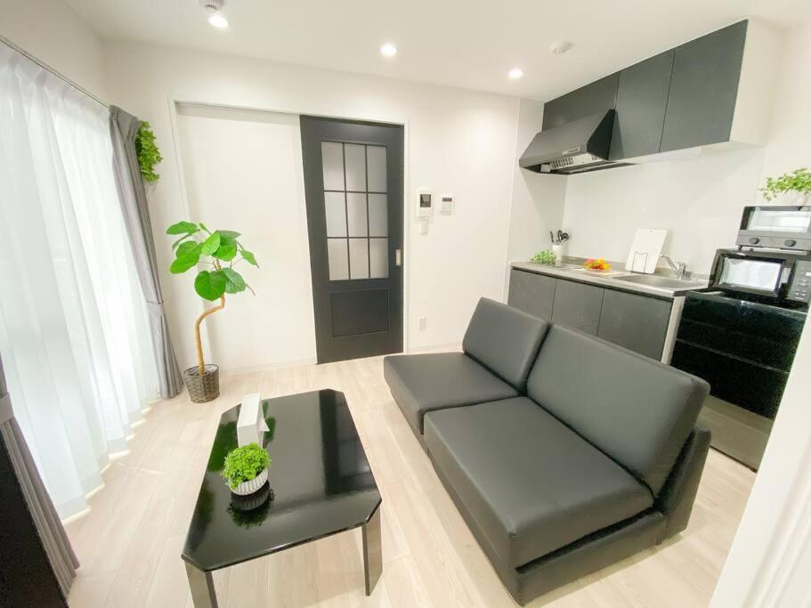Residential Hotel Glitter Usjまで1駅5分 Osaka Room photo