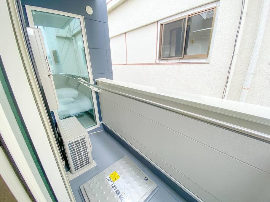 Residential Hotel Glitter Usjまで1駅5分 Osaka Room photo