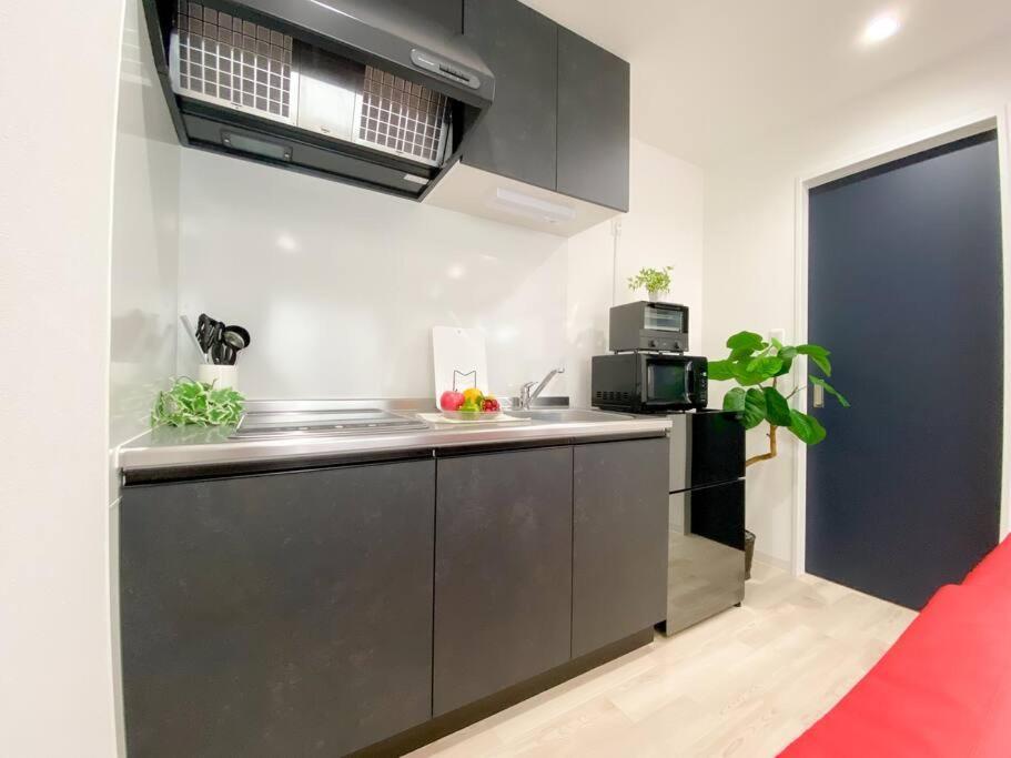 Residential Hotel Glitter Usjまで1駅5分 Osaka Room photo
