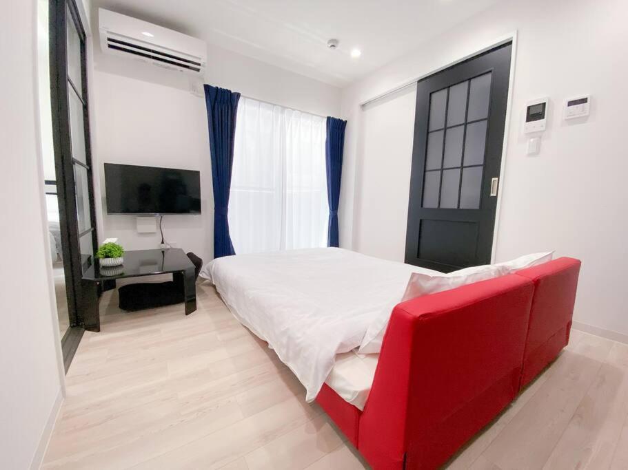 Residential Hotel Glitter Usjまで1駅5分 Osaka Room photo