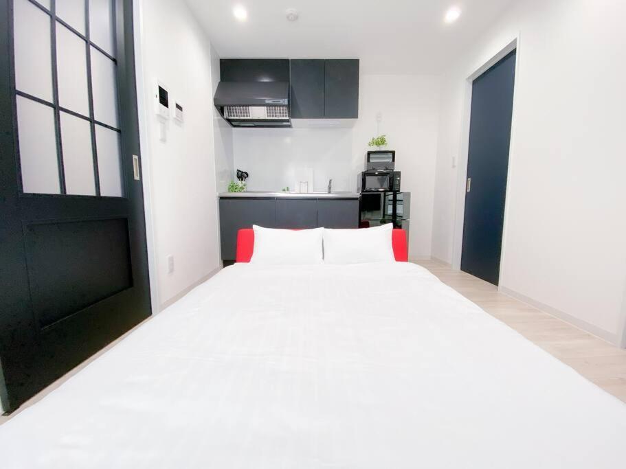 Residential Hotel Glitter Usjまで1駅5分 Osaka Room photo