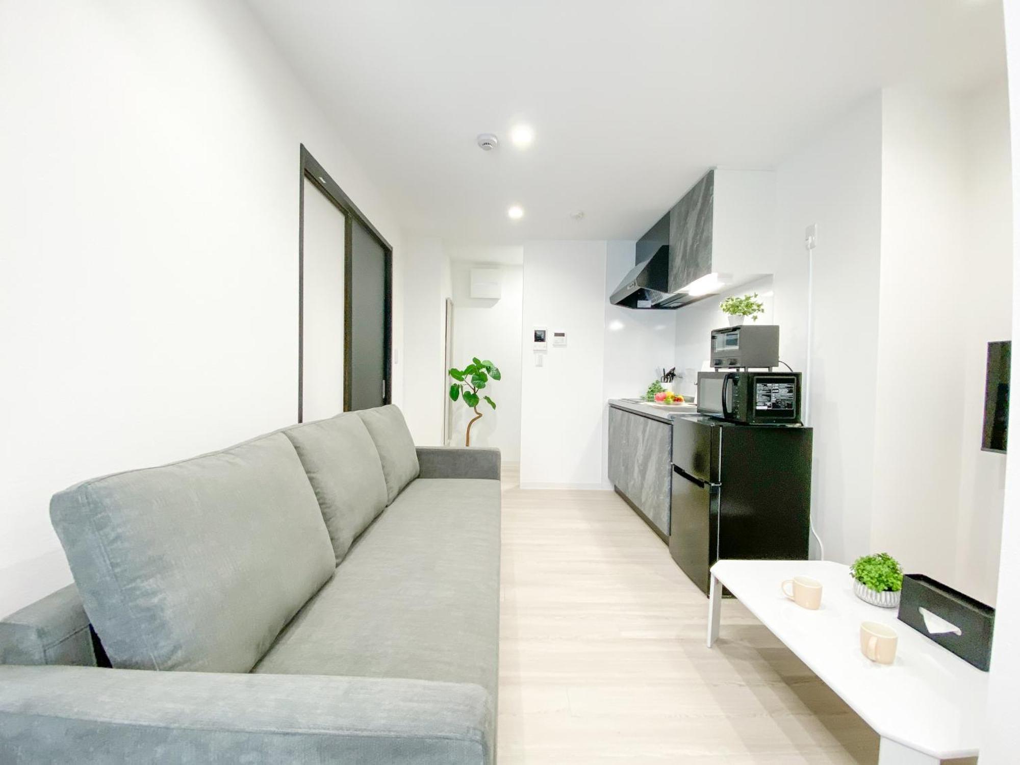 Residential Hotel Glitter Usjまで1駅5分 Osaka Room photo