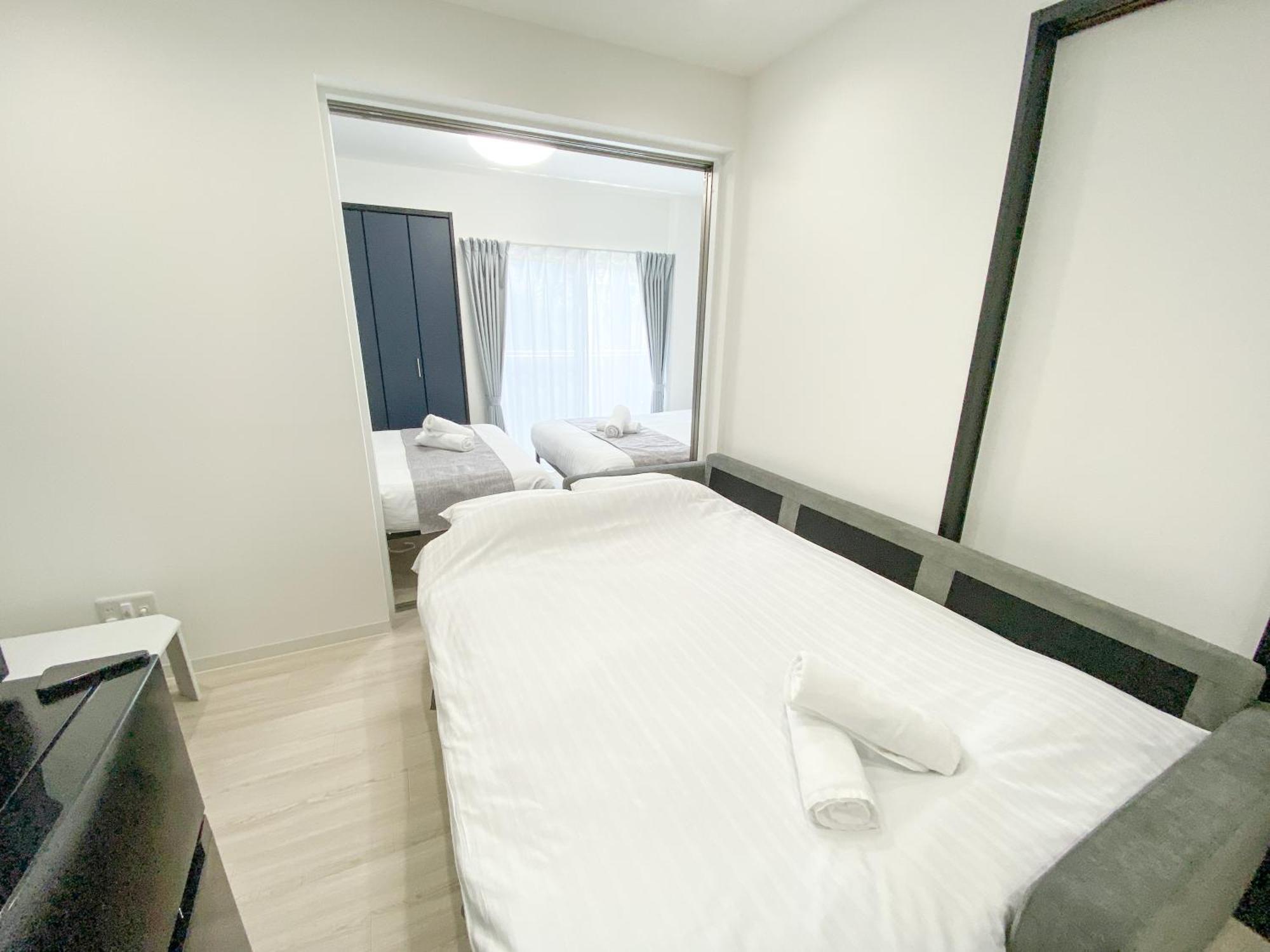 Residential Hotel Glitter Usjまで1駅5分 Osaka Room photo