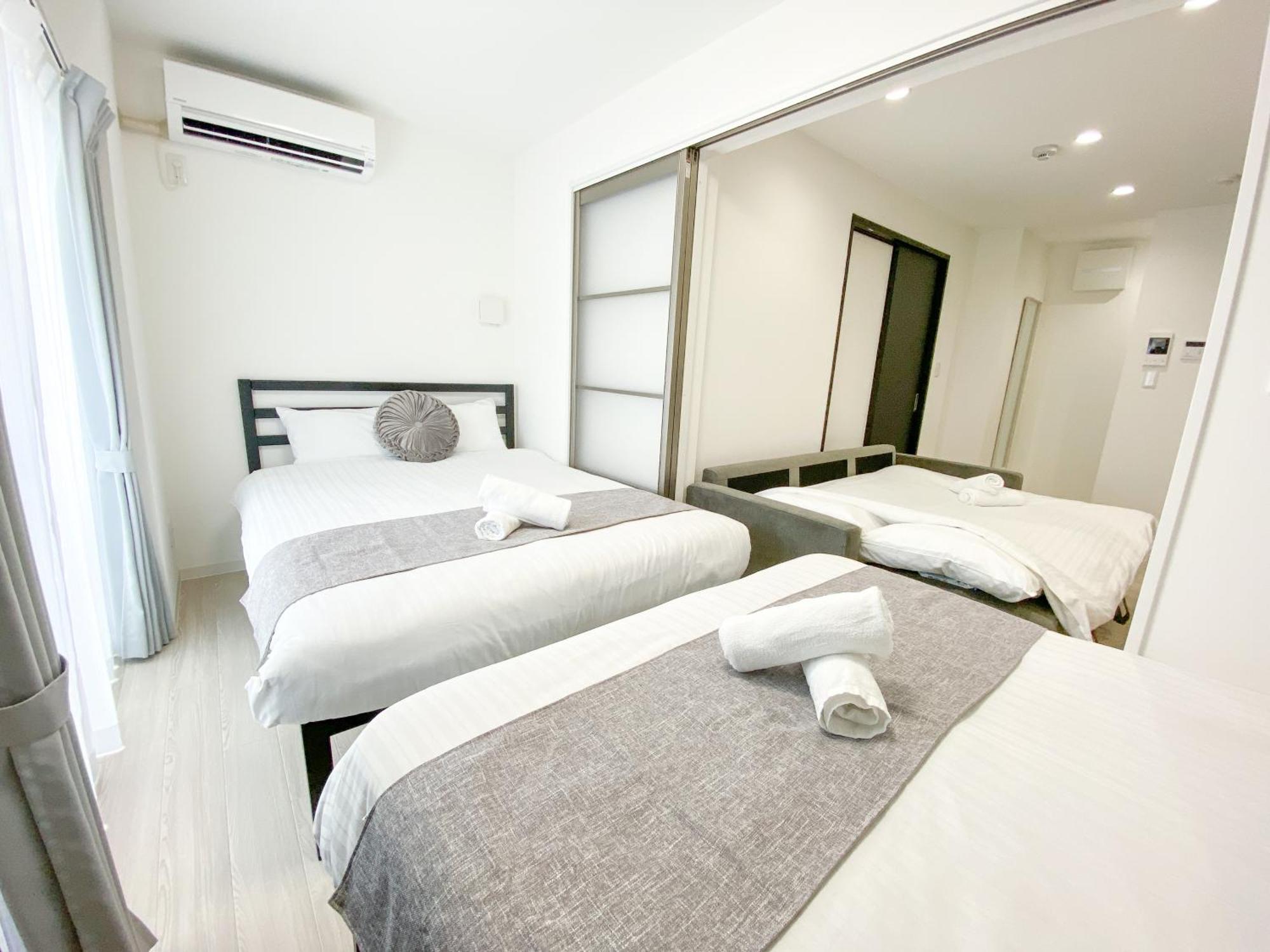 Residential Hotel Glitter Usjまで1駅5分 Osaka Room photo